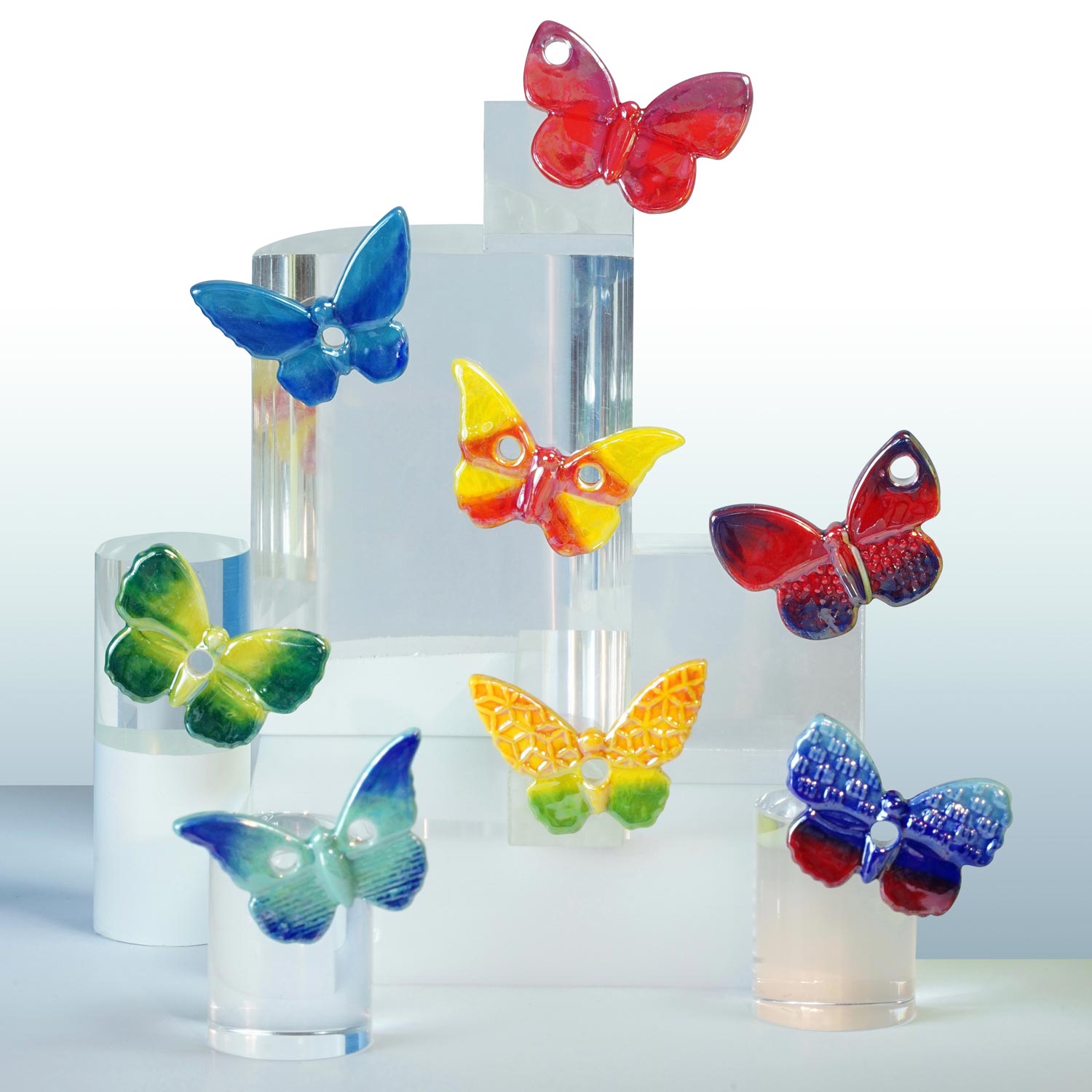 Série de fèves "NUÉE DE PAPILLONS IRISÉS" par le créateur de fèves "Prime"